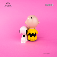 Carica l'immagine nel visualizzatore di Gallery, Statuina di Charlie Brown e Snoopy che leggono un foglio.